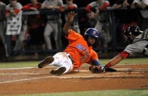 Buddy Reed slides around the tag and successfully steals home against Georgia on Friday, April 22 - Photo courtesy of Jordan McPherson / The Independent Florida Alligator