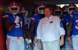 Florida Gators head coach Jim McElwain leads the team out for the spring game- 1280x853