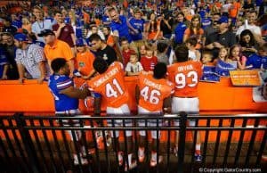 Florida Gators players sign autographs for the fans after spring game 2016-1280x855