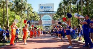 University of Florida cheerleaders line the way before the Florida Gators football team enters Ben Hill Griffin Stadium before the 2016 Orange and Blue Debut- Florida Gators football- 1280x854