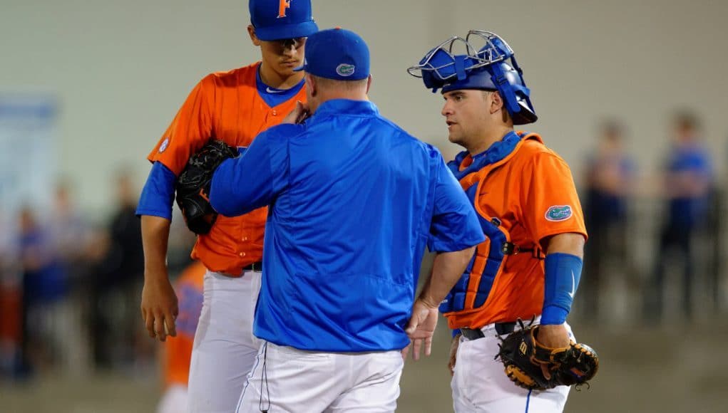 University of Florida head coach Kevin O’Sullivan meets with Mike Rivera and Dane Dunning during a win over Florida State in Gainesville- Florida Gators baseball- 1280x852