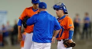 University of Florida head coach Kevin O’Sullivan meets with Mike Rivera and Dane Dunning during a win over Florida State in Gainesville- Florida Gators baseball- 1280x852