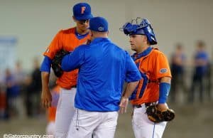 University of Florida head coach Kevin O’Sullivan meets with Mike Rivera and Dane Dunning during a win over Florida State in Gainesville- Florida Gators baseball- 1280x852