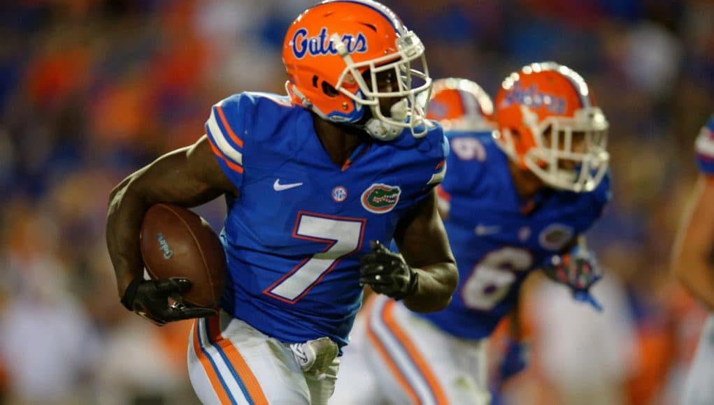 University of Florida junior cornerback Duke Dawson returns an interception for a touchdown in the Orange and Blue Debut on Friday, April 8, 2016- Florida Gators football- 1280x852