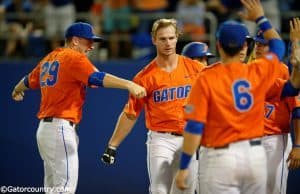 University of Florida junior first baseman Pete Alonso celebrates with teammates following his home run against Florida State- Florida Gators baseball- 1280x852