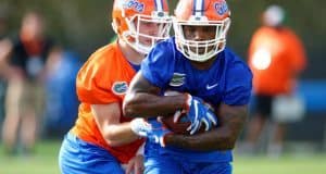 University of Florida running back Jordan Cronkrite takes a handoff from Luke Del Rio during spring camp- Florida Gators football- 1280x852