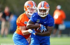 University of Florida running back Jordan Cronkrite takes a handoff from Luke Del Rio during spring camp- Florida Gators football- 1280x852