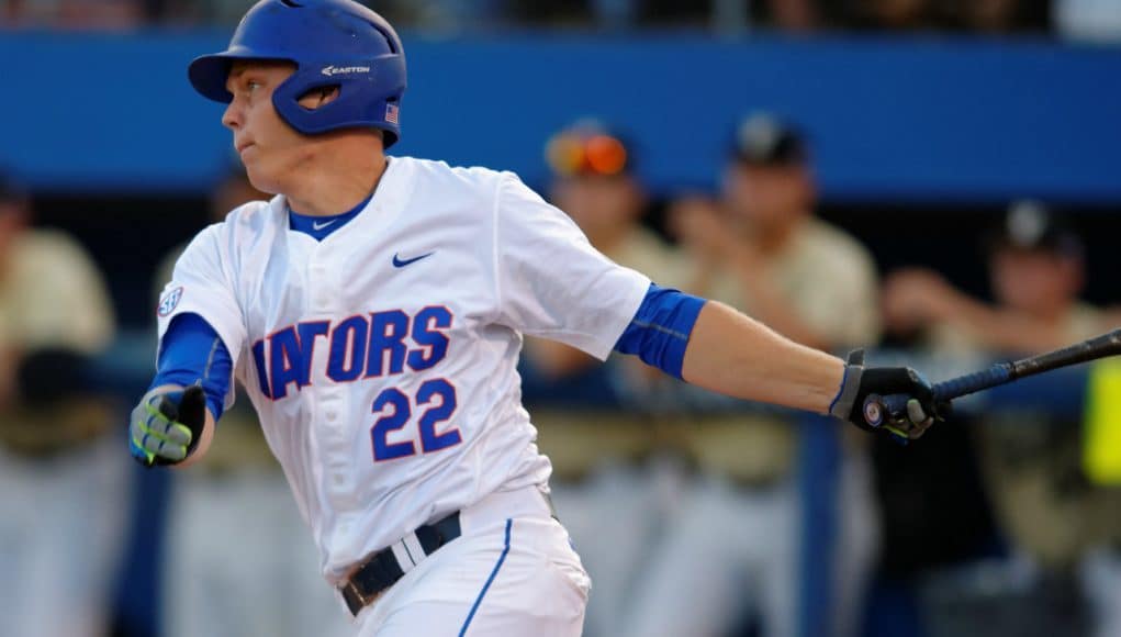 University of Florida catcher JJ Schwarz singles against the Vanderbilt Commodores at McKethan Stadium- Florida Gators baseball- 1280x852