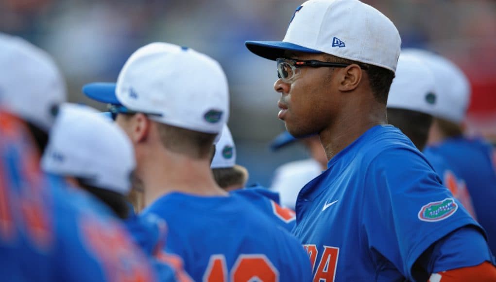 University of Florida center fielder Buddy Reed watches from the dugout as the Gators prepare to take on FGCU- Florida Gators baseball- 1280x852