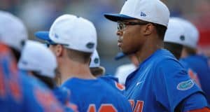 University of Florida center fielder Buddy Reed watches from the dugout as the Gators prepare to take on FGCU- Florida Gators baseball- 1280x852