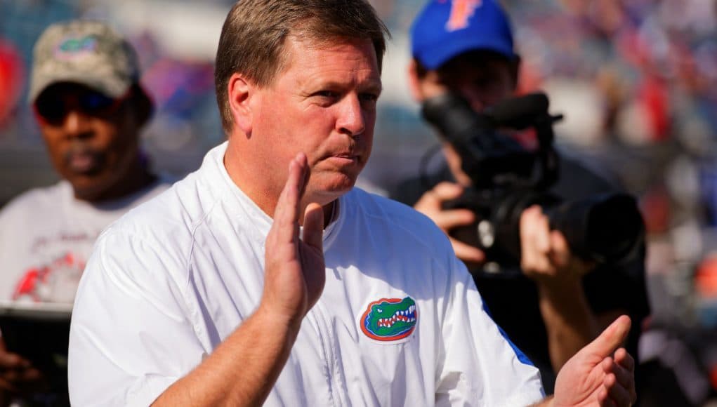 University of Florida head coach Jim McElwain leads his team through warmups before the Florida Gators game against the Georgia Bulldogs in 2015- Florida Gators football- 1280x852