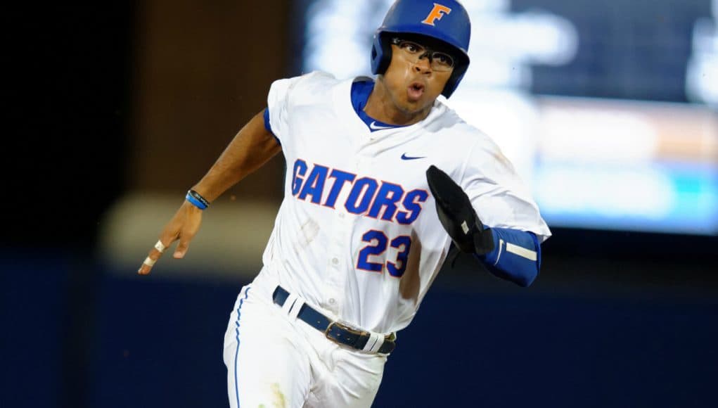 University of Florida outfielder Buddy Reed rounds third base before scoring the go-ahead run against Vanderbilt- Florida Gators baseball- 1280x852