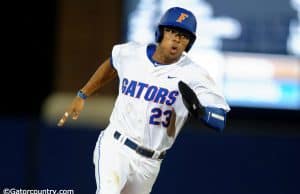 University of Florida outfielder Buddy Reed rounds third base before scoring the go-ahead run against Vanderbilt- Florida Gators baseball- 1280x852