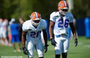 University of Florida safeties Marcus Maye (20) and Marcell Harris (26) go through drills during spring football camp- Florida Gators football- 1280x852