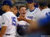 University of Florida second baseman Deacon Liput celebrates with teammates after scoring against Vanderbilt- Florida Gators baseball- 1280x852