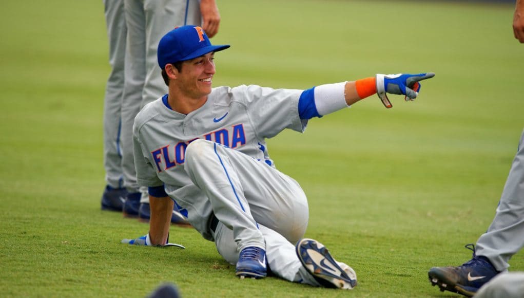 University of Florida shortstop Dalton Guthrie stretches before a Super Regional game against Florida State- Florida Gators baseball- 1280x852