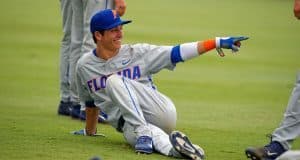 University of Florida shortstop Dalton Guthrie stretches before a Super Regional game against Florida State- Florida Gators baseball- 1280x852