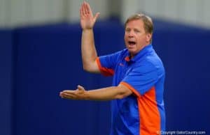 Florida Gators head coach Jim McElwain doing the Chomp during Friday Night Lights- 1280x853