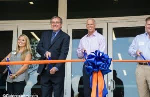 University of Florida President Kent Fuchs and Athletic Director Jeremy Foley cut the ribbon to officially open the Otis Hawkins Center at Farrior Hall- Florida Gators- 1280 x 852