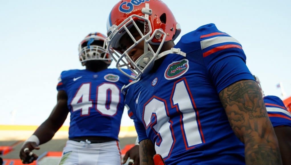 University of Florida defenders Jalen Tabor and Jarrad Davis take the field before the Orange and Blue Debut- Florida Gators football- 1280x852