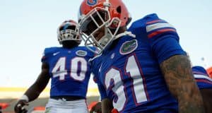 University of Florida defenders Jalen Tabor and Jarrad Davis take the field before the Orange and Blue Debut- Florida Gators football- 1280x852