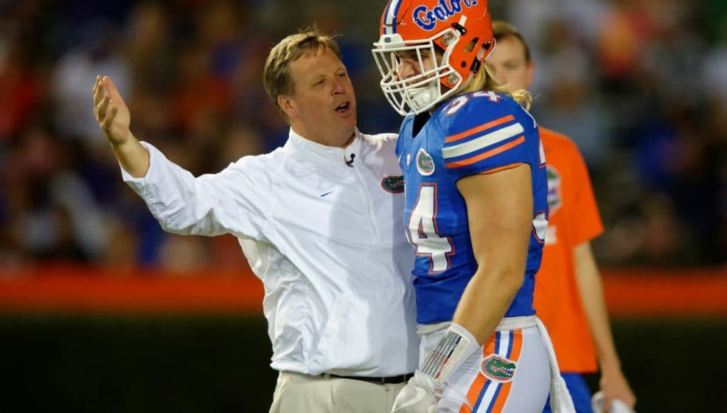 University of Florida head coach Jim McElwain jokes with senior linebacker Alex Anzalone during the Orange and Blue Debut- Florida Gators football- 1280x852