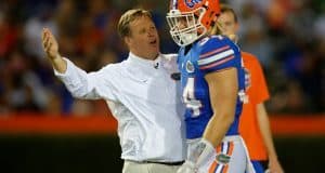 University of Florida head coach Jim McElwain jokes with senior linebacker Alex Anzalone during the Orange and Blue Debut- Florida Gators football- 1280x852