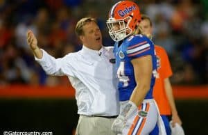 University of Florida head coach Jim McElwain jokes with senior linebacker Alex Anzalone during the Orange and Blue Debut- Florida Gators football- 1280x852