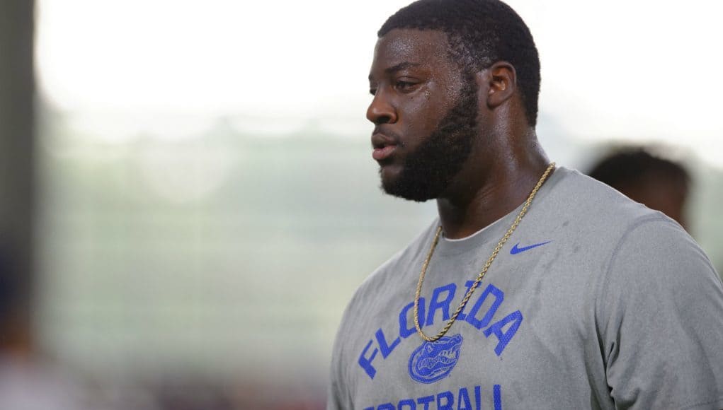 University of Florida junior offensive lineman David Sharpe coaches campers during Friday Night Lights- Florida Gators football- 1280x852