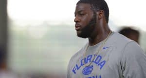 University of Florida junior offensive lineman David Sharpe coaches campers during Friday Night Lights- Florida Gators football- 1280x852