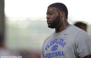 University of Florida junior offensive lineman David Sharpe coaches campers during Friday Night Lights- Florida Gators football- 1280x852