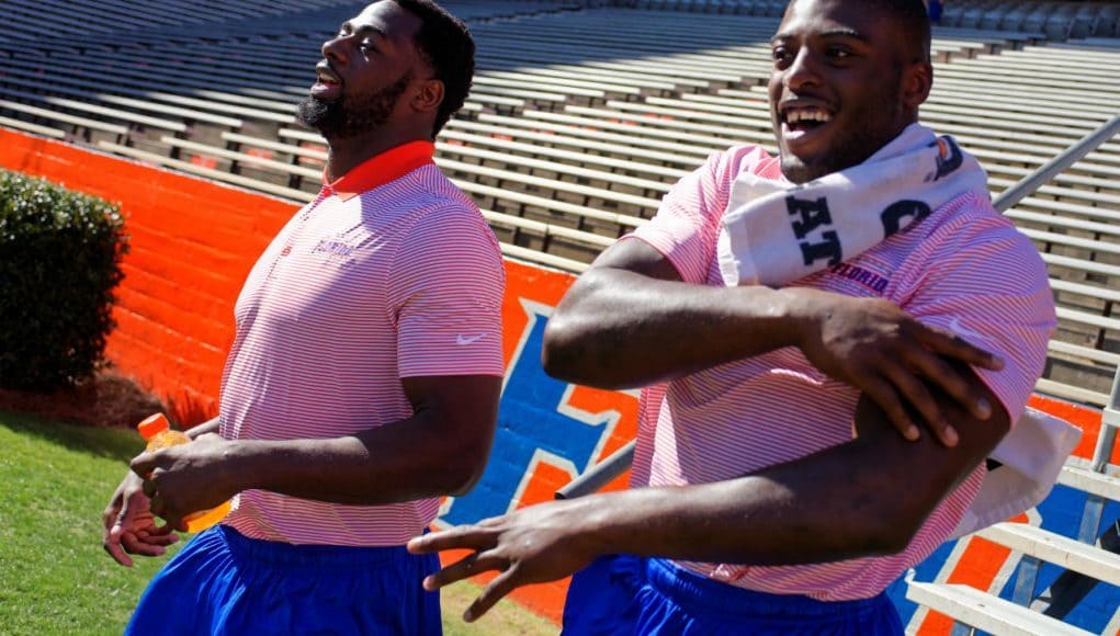 University of Florida seniors Marcus Maye and Jarrad Davis walk into Ben Hill Griffin Stadium before the Orange and Blue Debut- Florida Gators football- 1280x852