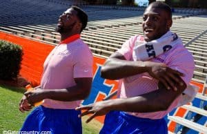University of Florida seniors Marcus Maye and Jarrad Davis walk into Ben Hill Griffin Stadium before the Orange and Blue Debut- Florida Gators football- 1280x852
