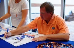 Florida Gators head coach Jim McElwain signs autographs at fan day- 1280x853