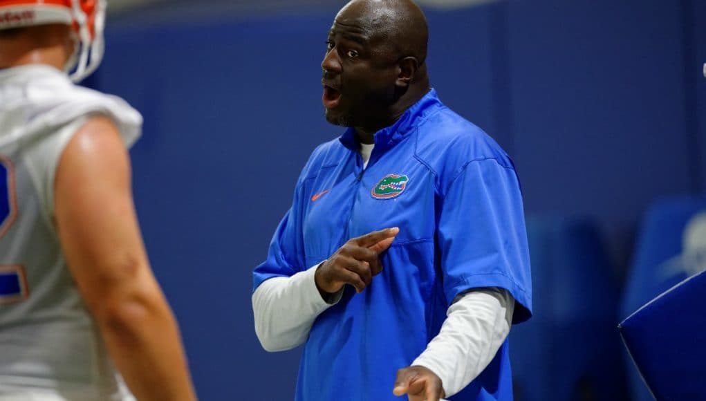 University of Florida defensive line coach Chris Rumph coaching during fall camp- Florida Gators football- 1280x852