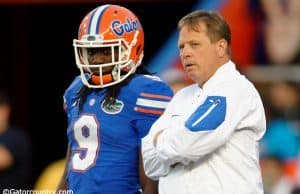 University of Florida head coach Jim McElwain and Dre Massey talk on the field during the Orange and Blue game- Florida Gators football- 1280x852
