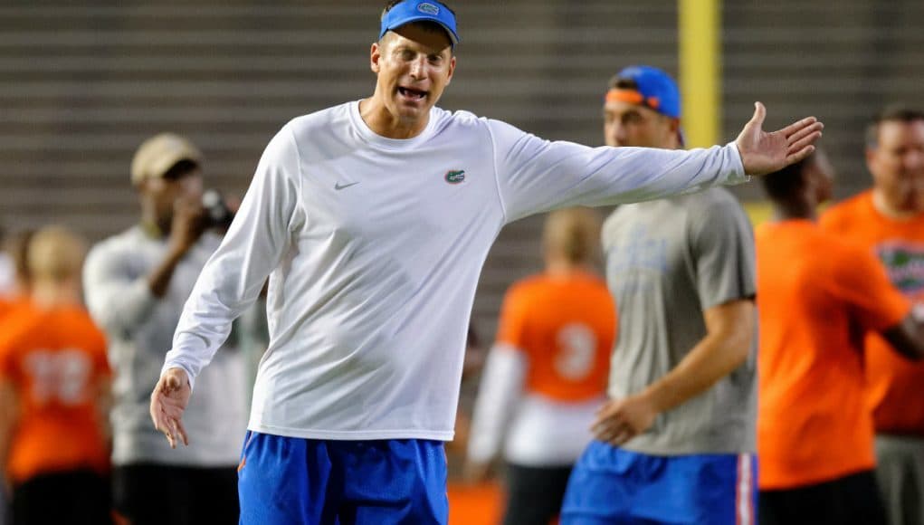 University of Florida offensive coordinator Doug Nussmeier coaches campers during Friday Night Lights- Florida Gators football- 1280x852