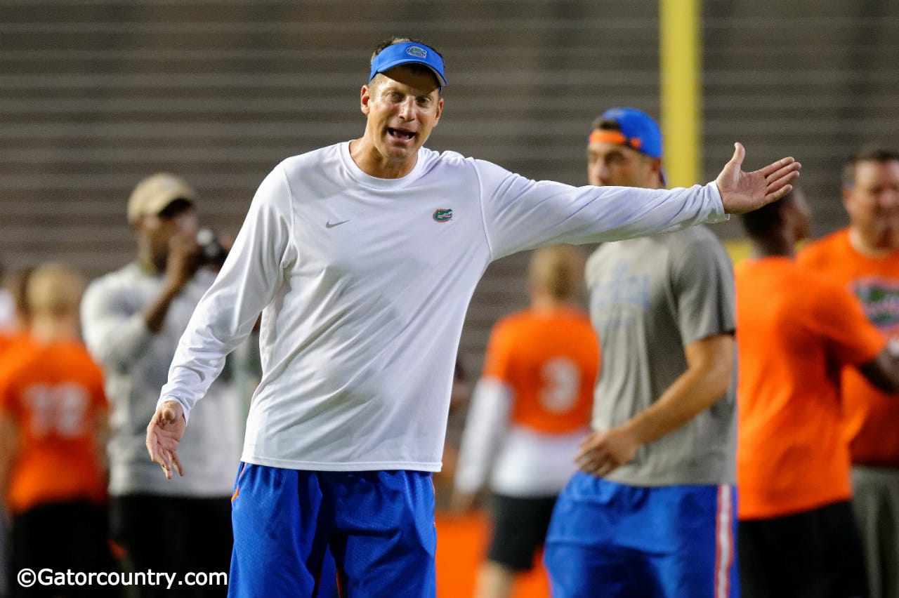 University of Florida offensive coordinator Doug Nussmeier coaches campers during Friday Night Lights- Florida Gators football- 1280x852