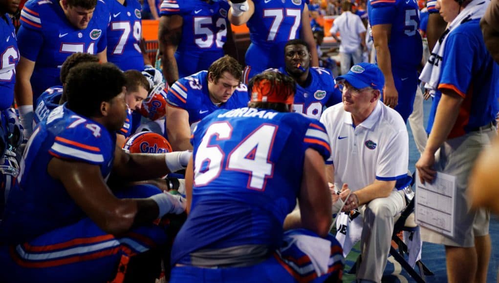 University of Florida offensive line coach Mike Summers works with his unit during Florida’s win over New Mexico State- Florida Gators football- 1280x854