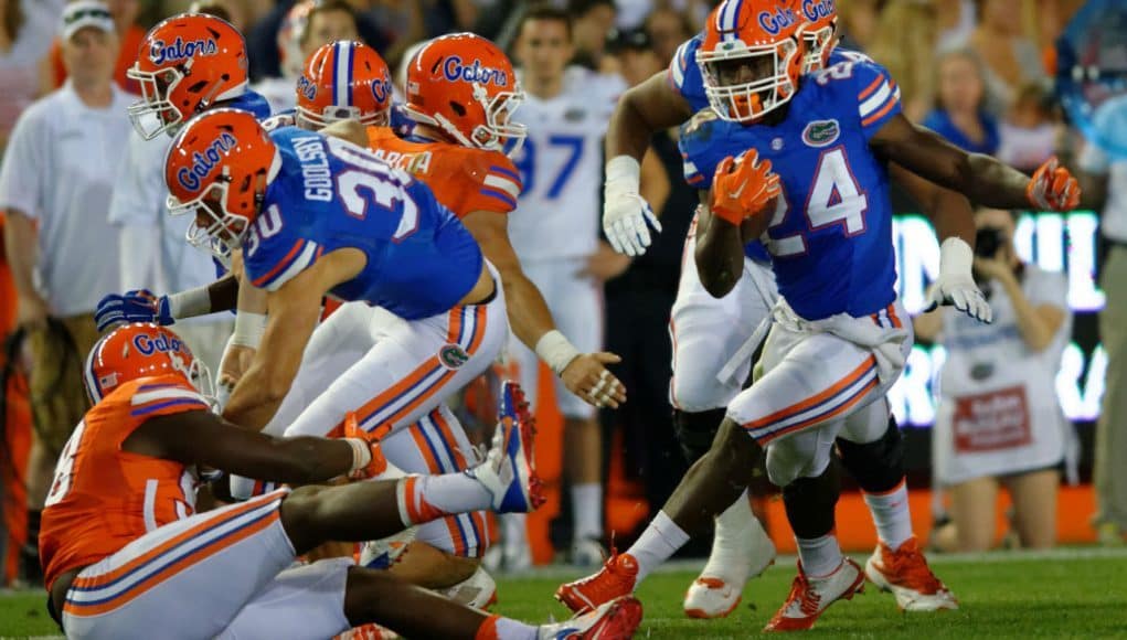 University of Florida running back Mark Thompson carries the ball during the Orange and Blue Debut- Florida Gators football- 1280x852