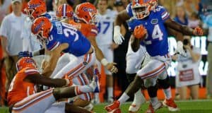 University of Florida running back Mark Thompson carries the ball during the Orange and Blue Debut- Florida Gators football- 1280x852