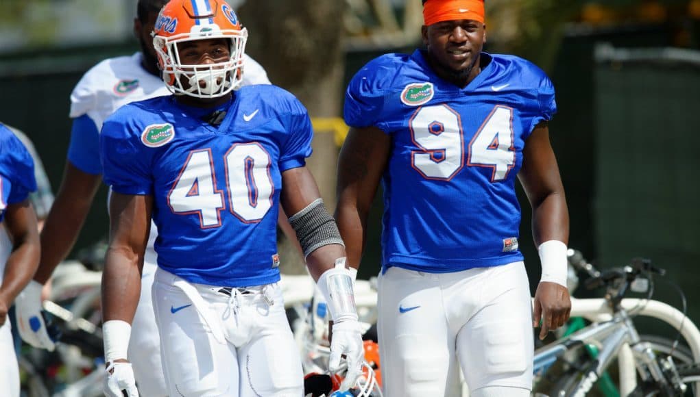 University of Florida seniors Jarrad Davis and Bryan Cox Jr. walk into the Gators’ sixth spring practice in 2015- Florida Gators football- 1280x852