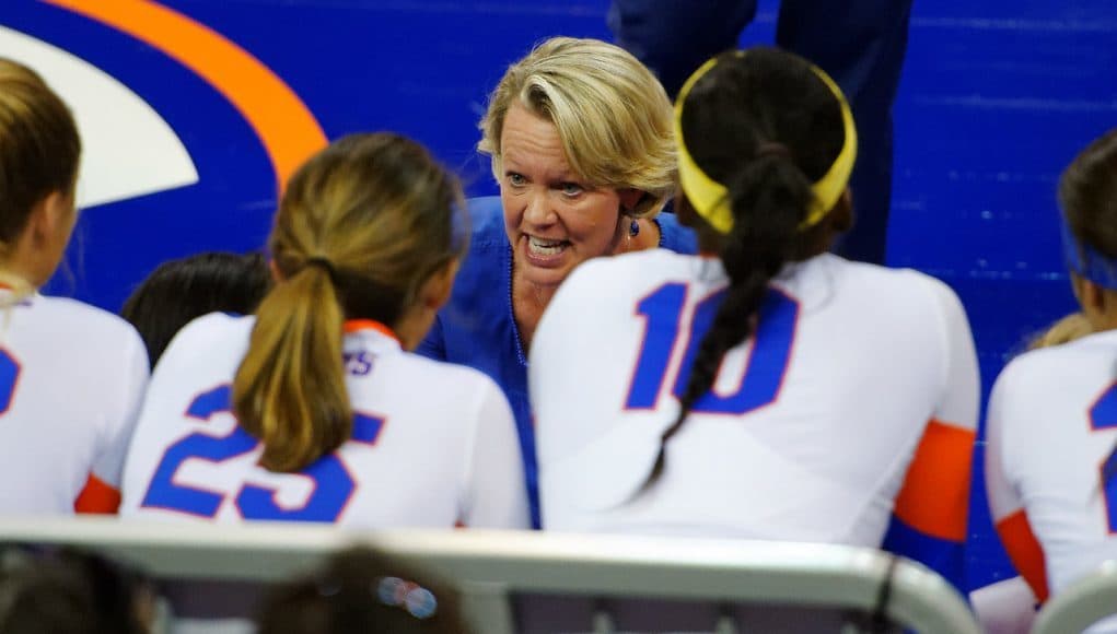 University of Florida volleyball coach Mary Wise coaches her team in a 2015 matchup against the Florida State Seminoles- Florida Gators volleyball- 1280x852