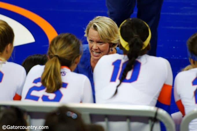 University of Florida volleyball coach Mary Wise coaches her team in a 2015 matchup against the Florida State Seminoles- Florida Gators volleyball- 1280x852