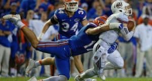 Florida Gators defensive end Jordan Sherit makes a sack against UMass- 1280x853