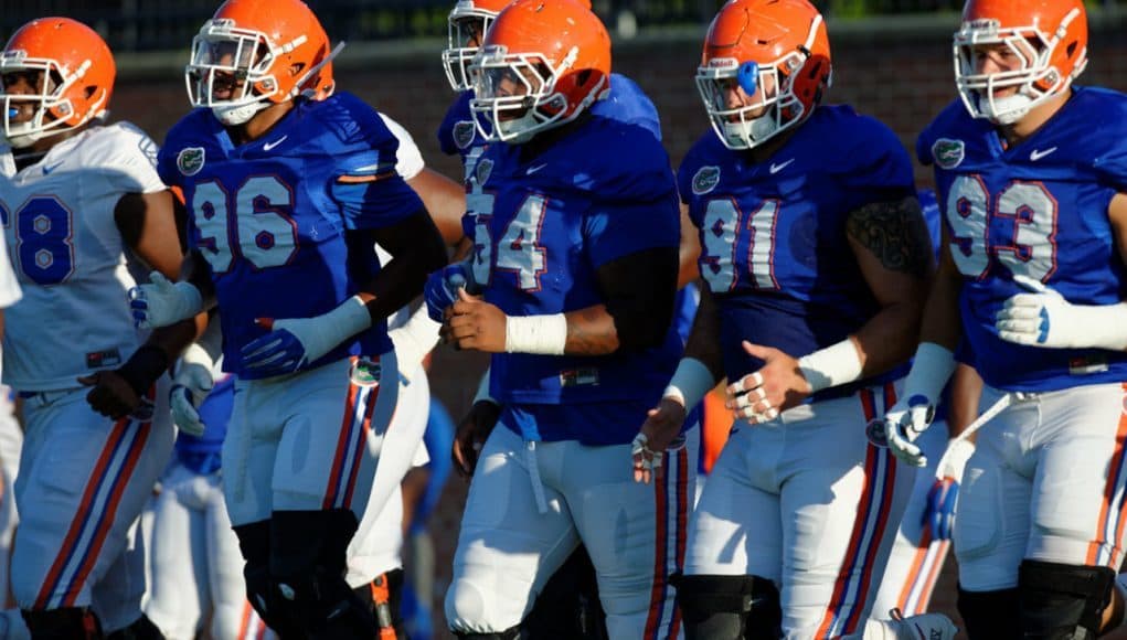 Florida Gators football team stretch before a fall practice - 1280x853