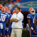 Florida Gators head coach Jim McElwain watches his team before the UMass game- 1280x853