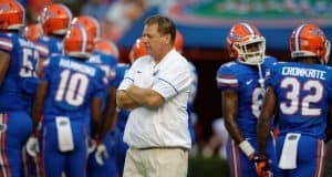 Florida Gators head coach Jim McElwain watches his team before the UMass game- 1280x853