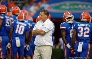 Florida Gators head coach Jim McElwain watches his team before the UMass game- 1280x853