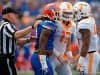 Florida Gators linebacker Daniel McMillan jaws with a Tennessee football player- 1280x853